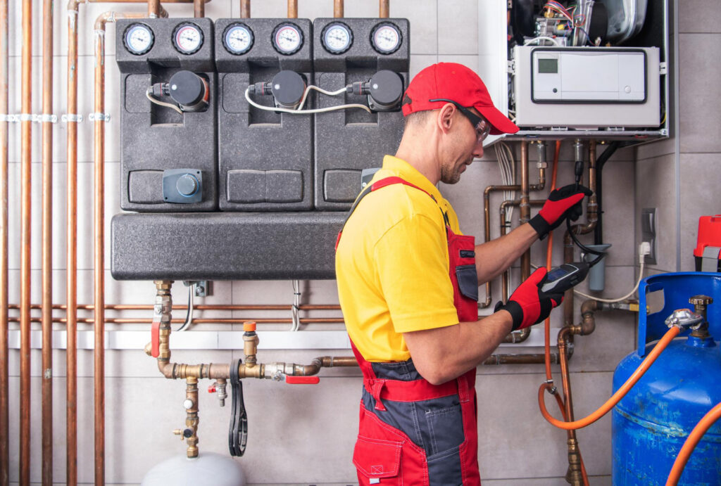 A Professional technician replacing a furnace